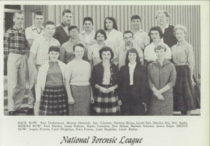 Black and white photo of the Downey High School National Forensic League team from the 1950s featuring a young Ron Underwood in the back row alongside teammates and coach Edna Spelts.